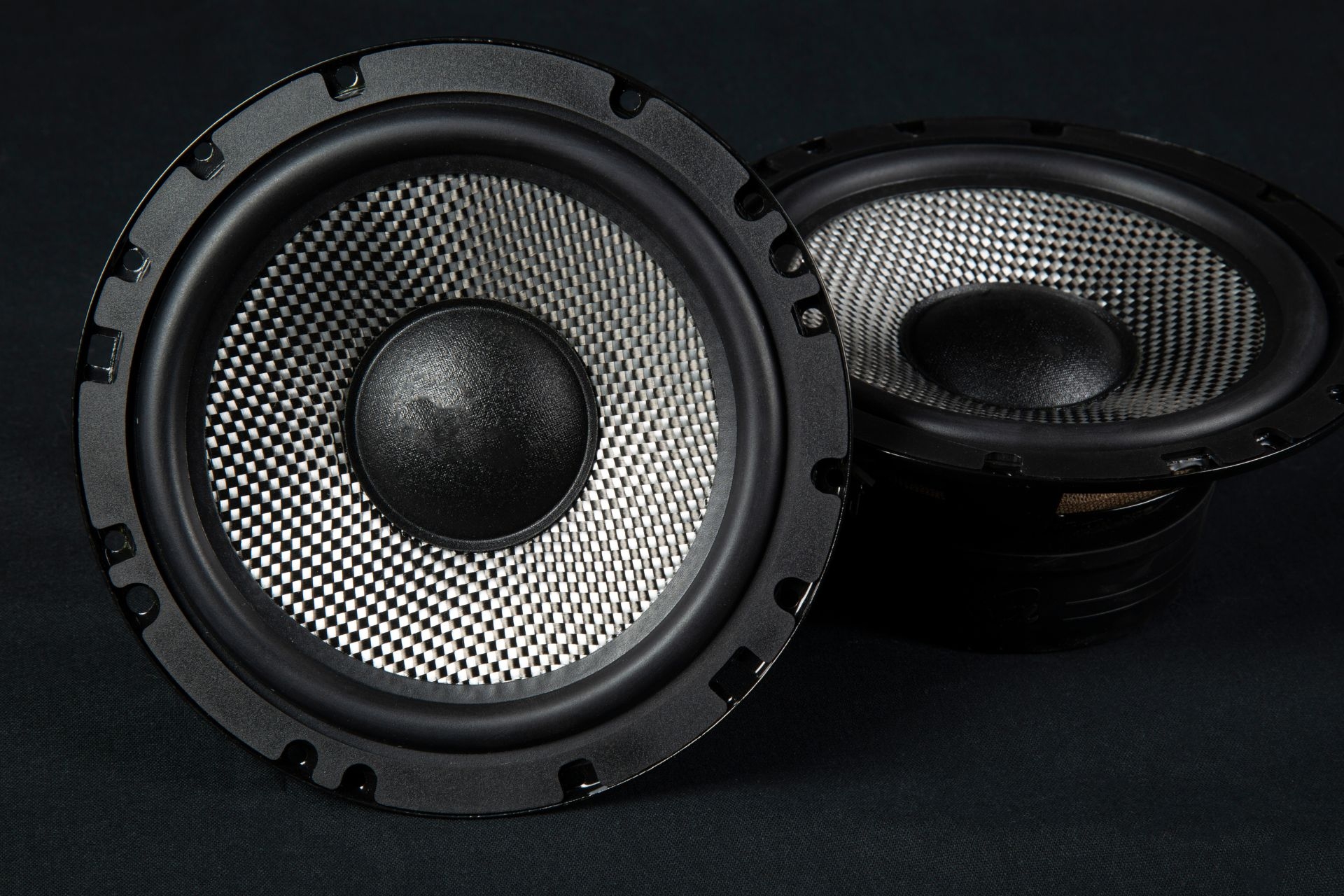Can ceiling speaker arrays be used for surround sound systems in home theaters?