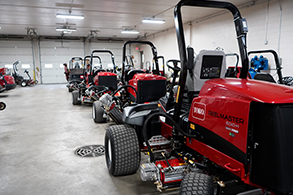 Mowers in warehouse storage