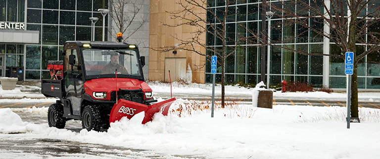 Toro Workman UTX plowing snow