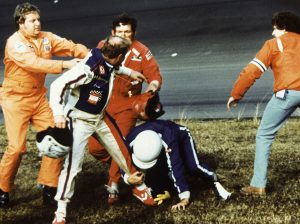 Track emergency workers try to break up a fight between Cale Yarborough, Donnie Allison and Bobby Allison after Yarborough and Donnie Allison crashed on the final lap while battling for the lead during the 1979 Daytona 500. (NASCAR photo)
