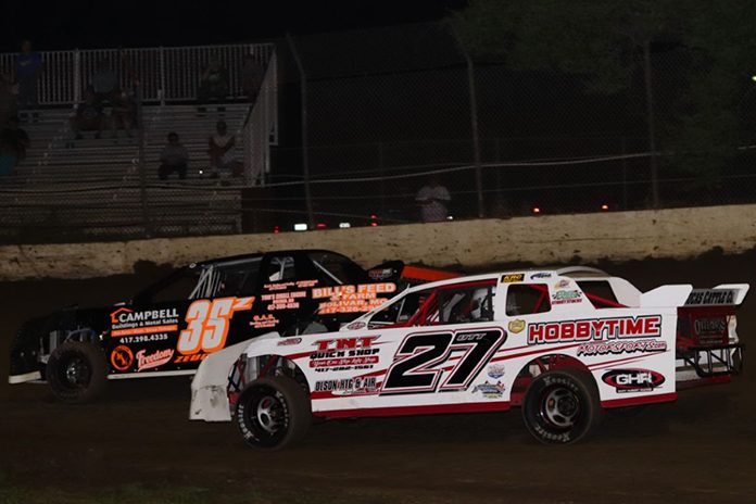 Toby Ott Zach Zeugin Central Missouri Toby Ott (27) made a low-side pass on Zach Zeugin (35) to claim the $1,500-to-win Street Stock Saturday at Central Missouri Speedway. (Joshua Allee Photo)