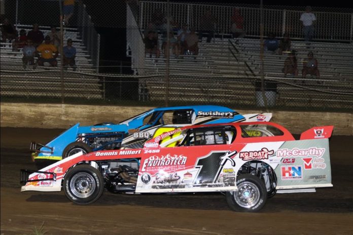 Tim Karrick (1k) battles Dean Wille Saturday night at Central Missouri Speedway. (Joshua Allee Photo) Tim Karrick (1k) battles Dean Wille Saturday night at Central Missouri Speedway. (Joshua Allee Photo)