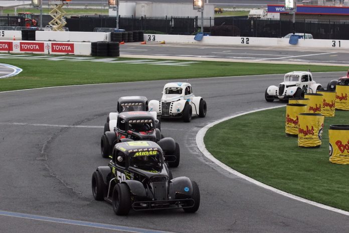 qKmz_wKw Carson Ferguson leads the Legend Car Pro feature at Charlotte Motor Speedway. (CMS photo)