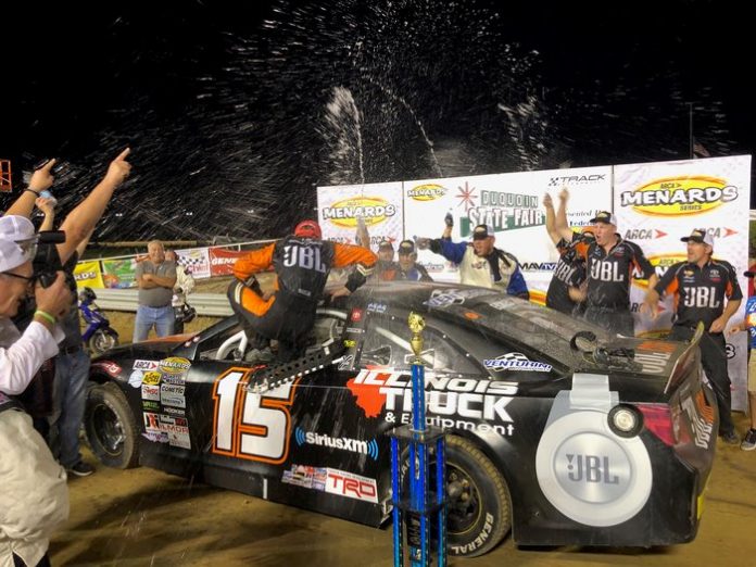 Christian Eckes exits his race car after winning the Southern Illinois 100 Saturday night. Christian Eckes exits his race car after winning the Southern Illinois 100 Saturday night.
