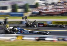 Antron Brown (near lane) battles Terry McMillen during the Mopar Express Lane NHRA Nationals at Maple Grove Raceway. (Dennis Bicksler Photo)
