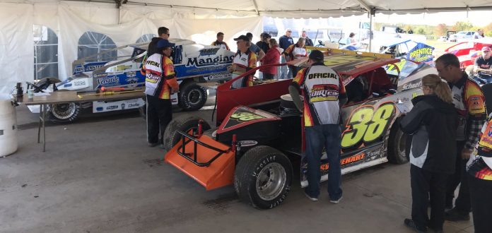 100819_SDW_EarlyInspection Cars are inspected Tuesday at Oswego Speedway. (DIRTcar photo)