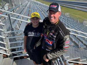 NHRA Pro Stock competitor Jason Line (right) with his son, Jack.