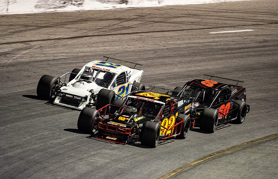 Anthony Nocella (92), Matt Hirscshman (60) and Jimmy Blewett battle for the lead during Wednesday's John Blewett III Memorial 76 at New Smyrna Speedway. (Jason Reasin Photo)