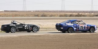 Aaron Downey leads Glen McCready to the finish line Sunday at the Buttonwillow Raceway Park Hoosier Super Tour to claim the win in E Production. (Marcelo Slamon Photo)