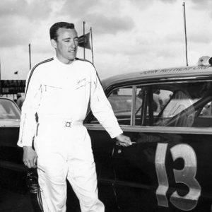 Johnny Rutherford beside the No. 13 entry fielded by Smokey Yunick. (NASCAR Photo)