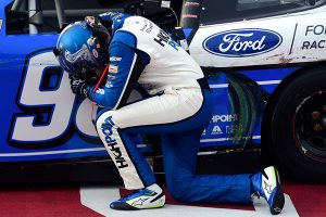 Chase Briscoe takes a moment to pray after winning Thursday's NASCAR Xfinity Series event at Darlington Raceway. (Getty Images Photo)