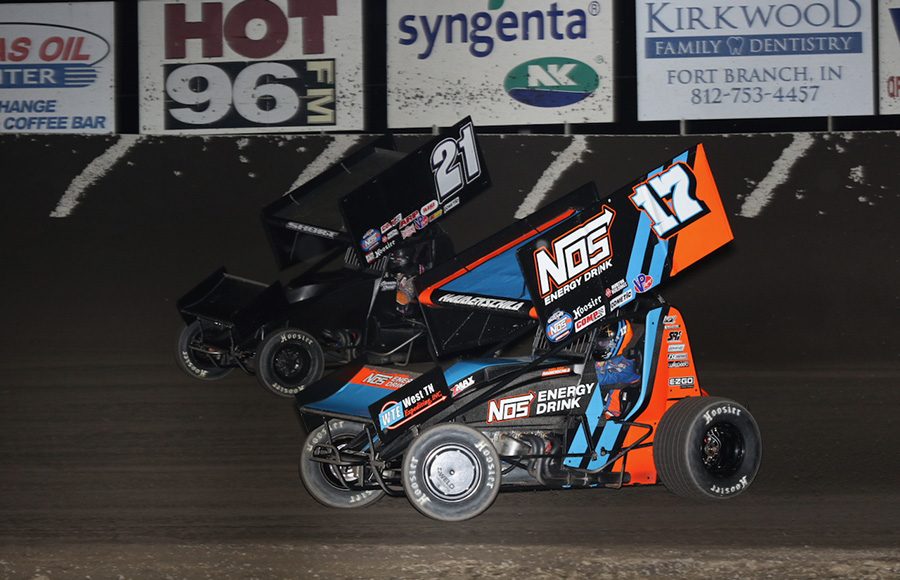 Sheldon Haudenschild (17) battles Carson Short during Friday's World of Outlaws NOS Energy Drink Sprint Car Series event at Tri-State Speedway. (Neil Cavanah Photo)