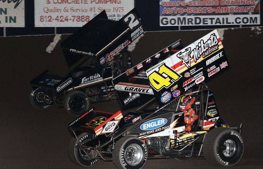 David Gravel (41) races under Carson Macedo during Friday's World of Outlaws NOS Energy Drink Sprint Car Series event at Tri-State Speedway. (Neil Cavanah Photo)