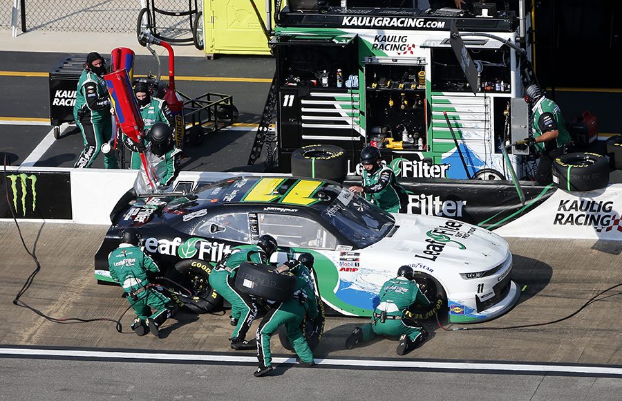 Justin Haley's crew goes to work during a pit stop as part of Saturday's NASCAR Xfinity Series Unhinged 300 at Talladega Superspeedway. (Brian Lawdermilk/Getty Images Photo)