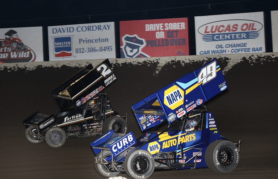 Brad Sweet (49) chases Carson Macedo during Saturday's World of Outlaws NOS Energy Drink Sprint Car Series event at Tri-State Speedway. (Neil Cavanah Photo)