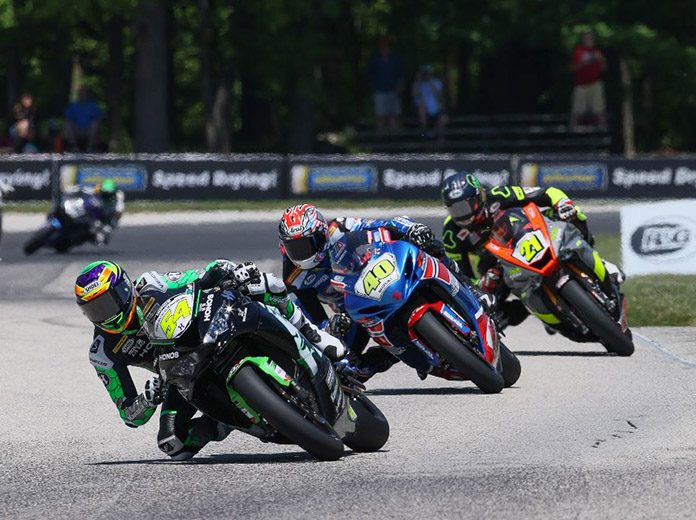 Richie Escalante (54) kept his perfect season alive in Supersport with a win over Sean Dylan Kelly (40) and Brandon Paasch (21). (Brian J. Nelson Photo) Richie Escalante (54) kept his perfect season alive in Supersport with a win over Sean Dylan Kelly (40) and Brandon Paasch (21). (Brian J. Nelson Photo)