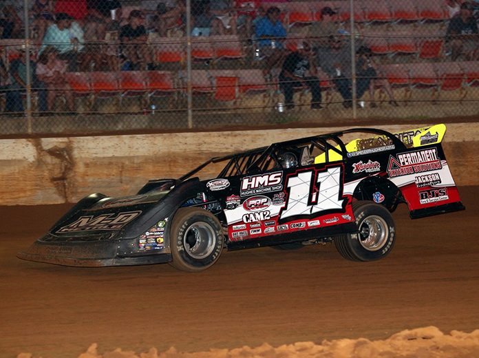 Spencer Hughes won Thursday's COMP Cams Super Dirt Series event at Ark-La-Tex Speedway. Spencer Hughes won Thursday's COMP Cams Super Dirt Series event at Ark-La-Tex Speedway.