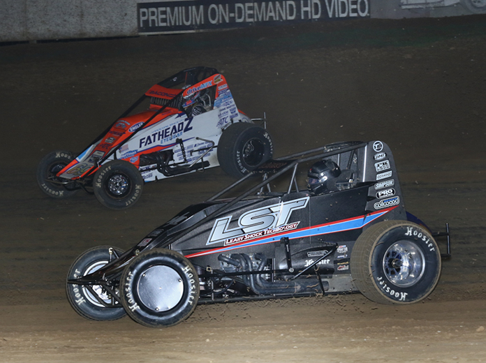 C.J. Leary (30) races under Brady Bacon during Saturday's USAC AMSOIL National Sprint Car Series feature at Lincoln Park Speedway. (Neil Cavanah Photo)