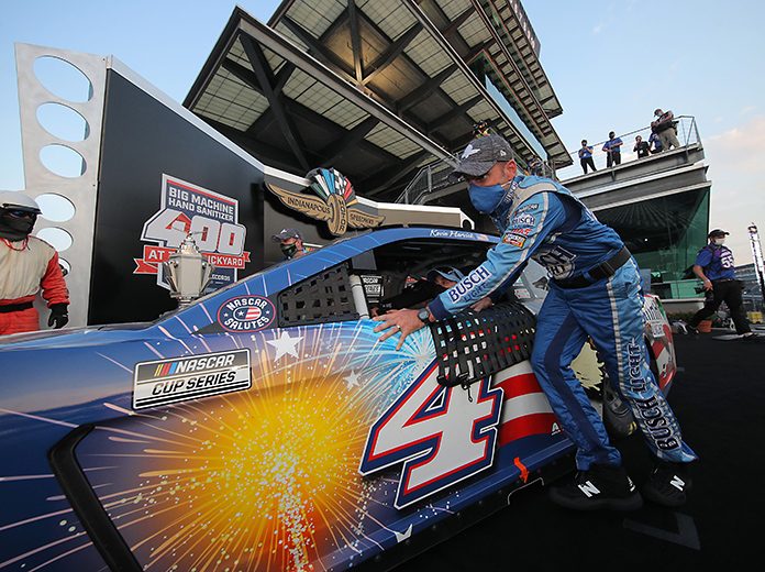 Rodney Childers, crew chief of the No. 4 Busch Light Patriotic Ford driven by Kevin Harvick, pushes the car from victory lane after winning the Big Machine Hand Sanitizer 400 Sunday at Indianapolis Motor Speedway. (Chris Graythen/Getty Images Photo) Rodney Childers, crew chief of the No. 4 Busch Light Patriotic Ford driven by Kevin Harvick, pushes the car from victory lane after winning the Big Machine Hand Sanitizer 400 Sunday at Indianapolis Motor Speedway. (Chris Graythen/Getty Images Photo)