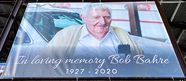 A banner on the Main Grandstand is just one way the late track founder and New England motorsports pioneer, Bob Bahre, is being honored during the NASCAR Cup Series Foxwoods Resort Casino 301 at New Hampshire Motor Speedway this weekend. (NHMS Photo) A banner on the Main Grandstand is just one way the late track founder and New England motorsports pioneer, Bob Bahre, is being honored during the NASCAR Cup Series Foxwoods Resort Casino 301 at New Hampshire Motor Speedway this weekend. (NHMS Photo)