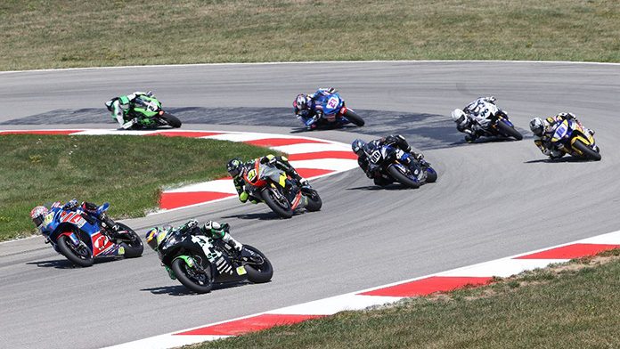 Riders battle for position during Sunday's MotoAmerica Supersport race at Pittsburgh Int'l Race Complex. (Brian J. Nelson Photo) Riders battle for position during Sunday's MotoAmerica Supersport race at Pittsburgh Int'l Race Complex. (Brian J. Nelson Photo)