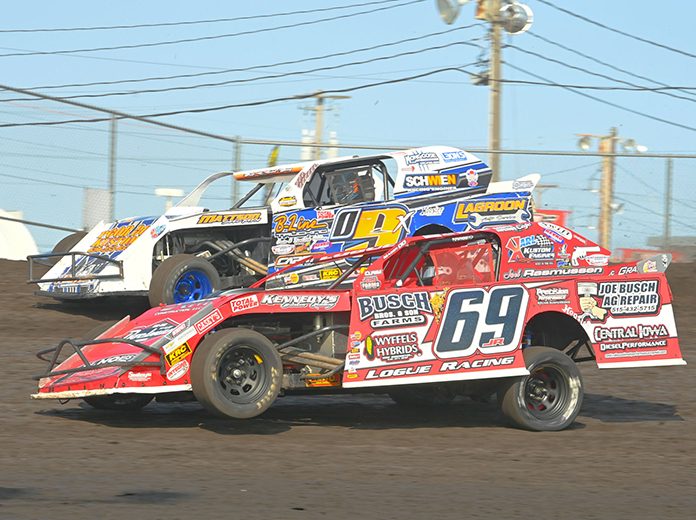 Johnathon Logue (69) battles alongside Brett Berry during the Northern sportmod feature during the IMCA Speedway Motors Super Nationals Sunday at Boone Speedway. (Tom Macht Photo) Johnathon Logue (69) battles alongside Brett Berry during the Northern sportmod feature during the IMCA Speedway Motors Super Nationals Sunday at Boone Speedway. (Tom Macht Photo)