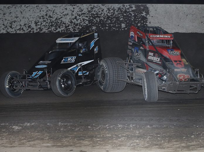 Korey Ruble (17) makes contact with Kyle Cummins as they race for the lead during the Haubstadt Hustler Saturday at Tri-State Speedway. (Neil Cavanah Photo) Korey Ruble (17) makes contact with Kyle Cummins as they race for the lead during the Haubstadt Hustler Saturday at Tri-State Speedway. (Neil Cavanah Photo)