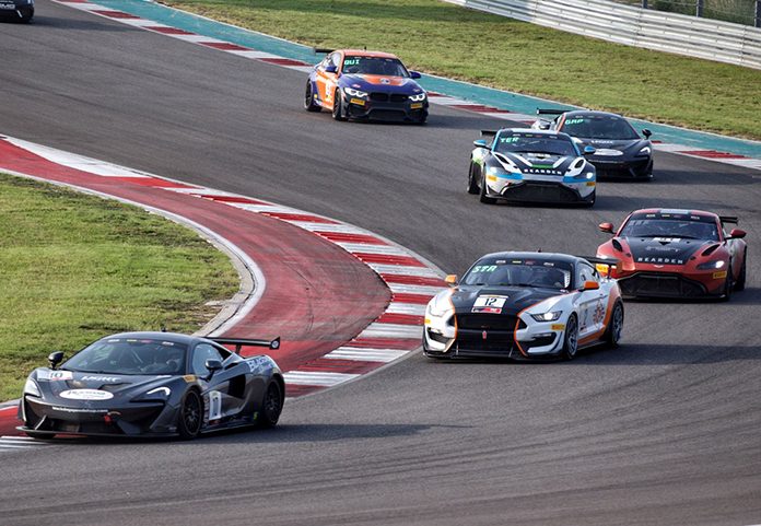 Michael Cooper leads the way during Sunday's Pirelli GT4 America Sprint Championship event at Circuit of the Americas. Michael Cooper leads the way during Sunday's Pirelli GT4 America Sprint Championship event at Circuit of the Americas.