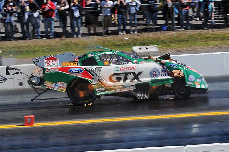 Ashley Force Hood KABOOM!: The engine on Ashley Force Hood’s NHRA Funny Car explodes, destroying the body on her Castrol GTX Ford Mustang during her a first-round meeting with Cruz Pedregon at Pennsylvania’s Maple Grove Raceway Sunday. (Harry Cella Photo)