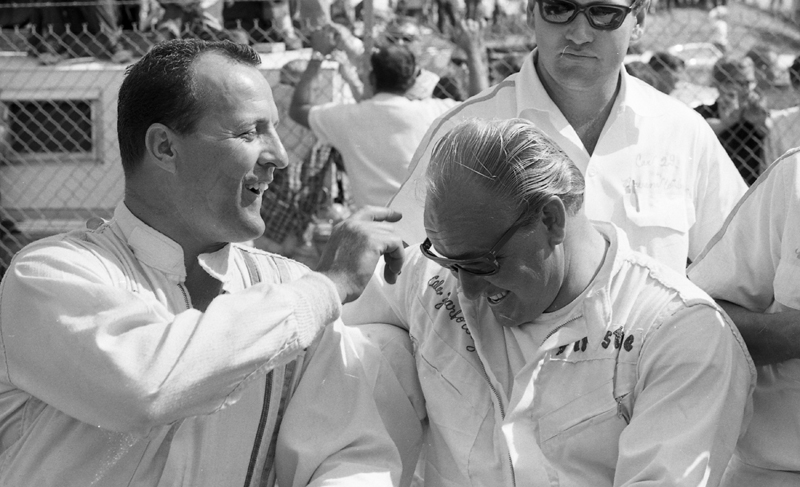Racing Champions A J Foyt Left And Cale Yarborough Enjoy A Playful Moment Prior To The October 1966 Nascar Grand National Race At Charlotte Motor Speedway Speed Sport