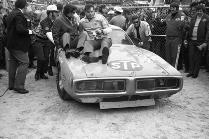 Richard Petty wins Members of the Petty Enterprises team ride to victory lane after Richard Petty won the Daytona 500.