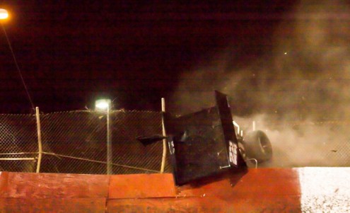 At this point Shawn Murray's car is almost entirely outside the track. (R.E. Wing Photo)