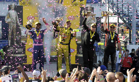 (From left) Antron Brown, Matt Hagan, Drew Skillman and Eddie Kraweic scored victories on Sunday in NHRA competition at the Texas Motorplex. (NHRA Photo)