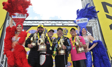 (From left) Shane Gray, Steve Torrence, John Force and Jerry Savoie celebrate after winning in their respective NHRA classes on Sunday at The Strip at Las Vegas. (NHRA Photo)