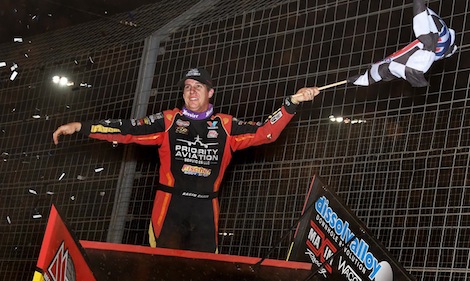 Jason Johnson celebrates in victory lane Friday night at The Dirt Track at Charlotte. (Frank Smith photo)
