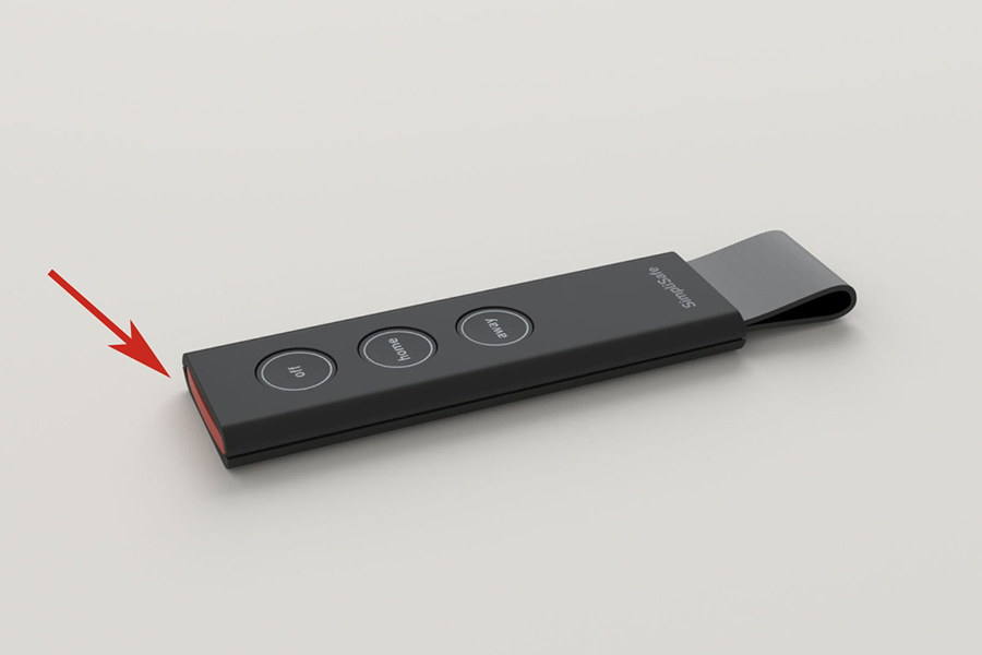 Red arrow pointing at panic button on top of the SimpliSafe® Key Fob