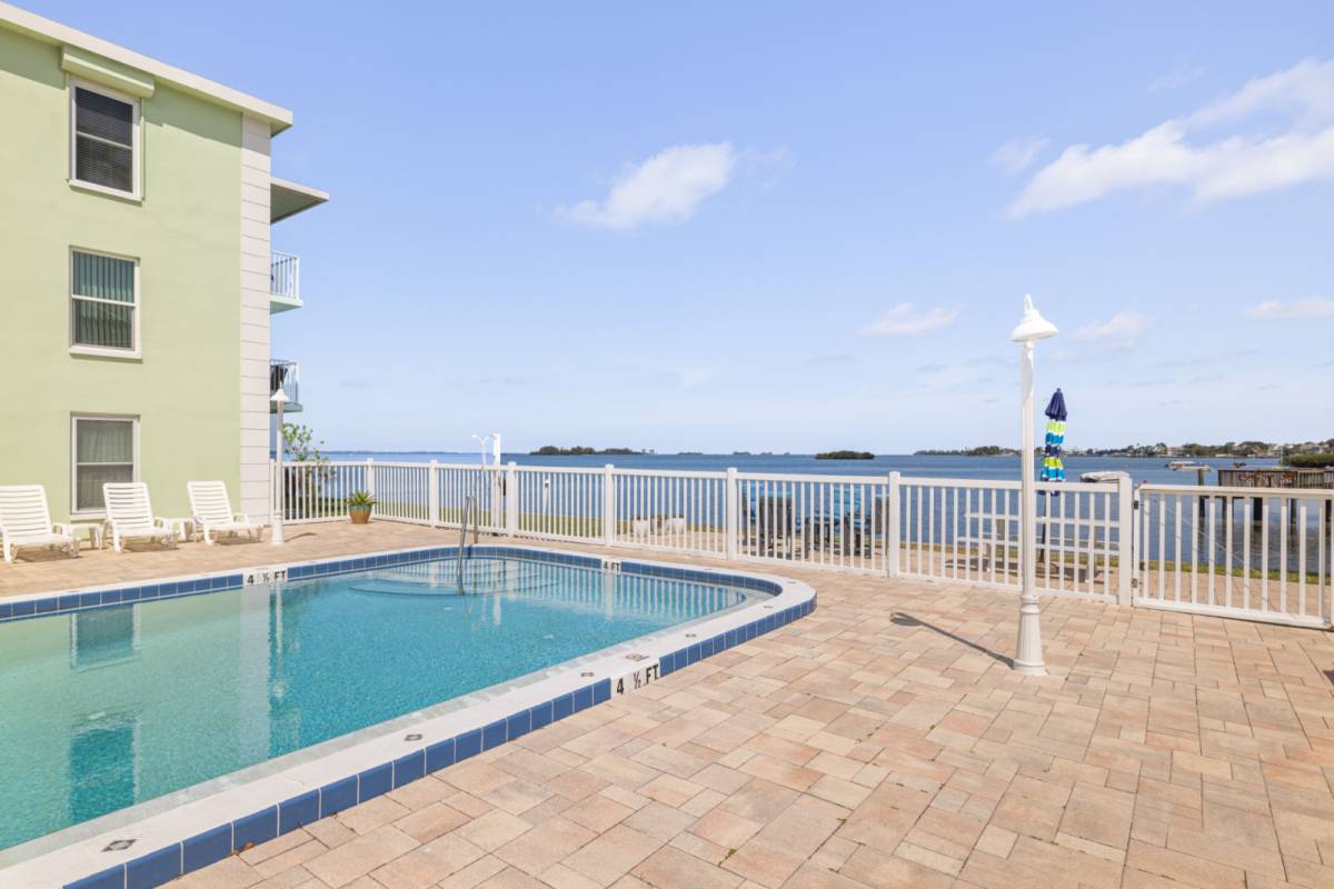 Dunedin Vacation Rental Waterfront Condo with Heated Pool! 2 Miles to