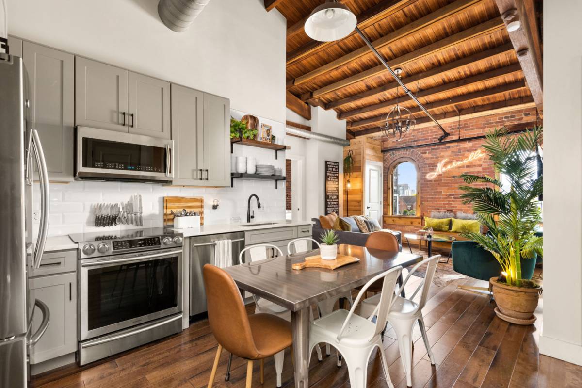 29 Industrial Loft Design Features for Modern Urban Comfort - Industrial Lofts With Penthouse View And Rooftop Access