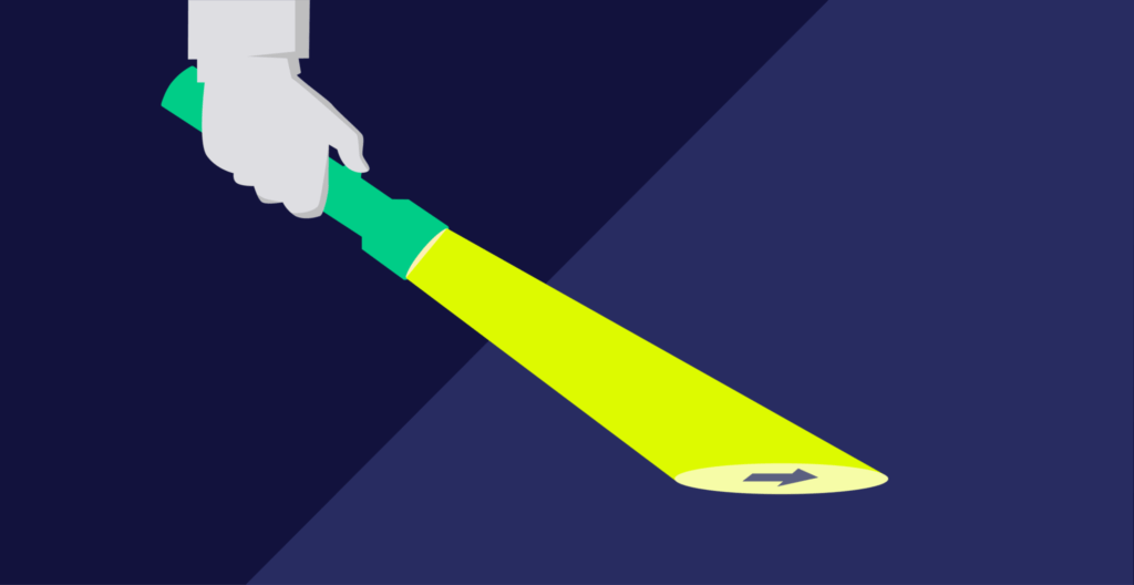 Hand holding a flashlight