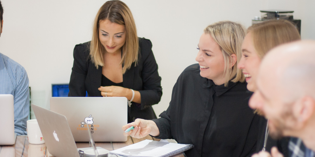 What are the benefits of working with an advertising agency?