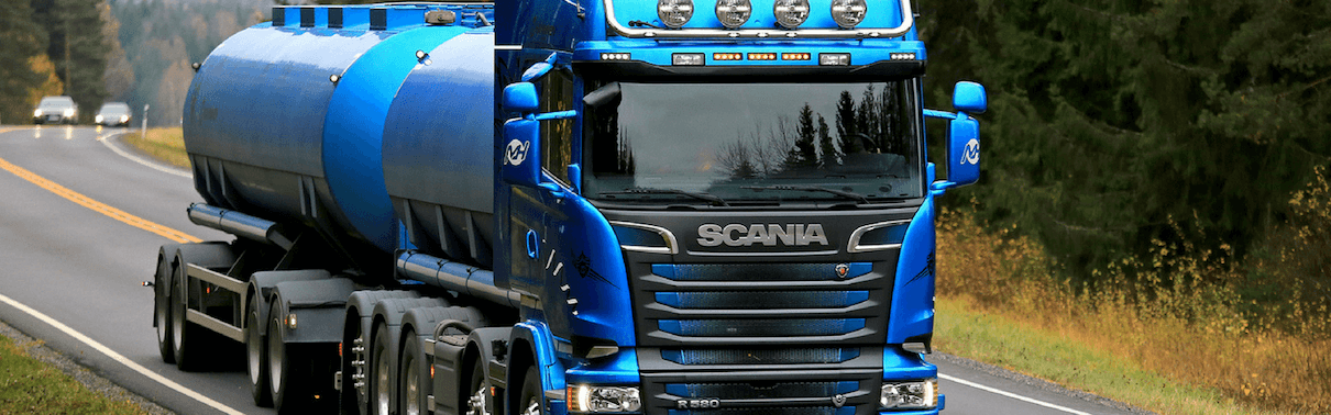 Blue scania lorry driving