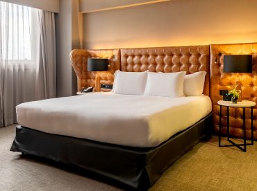 presidential-suite-by-trousseau-01-king-size-bed-meeting-space-executive-lounge-access