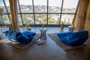 Photo of seating area with city in background for filming location