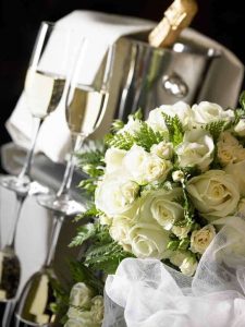 Photo of champagne and flowers