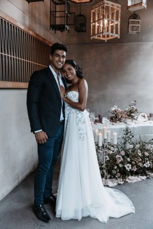 Photo of a newly married couple posing for photos