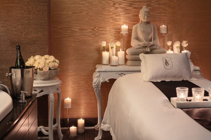 Photo of candlelit guest treatment room