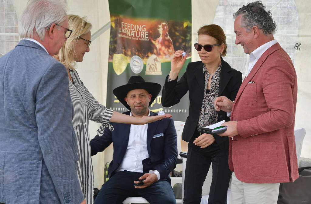 Choosing ballads at random to determine which judge would decide a final tie between two horses--there were FIVE ties in this competition which required final resolution.