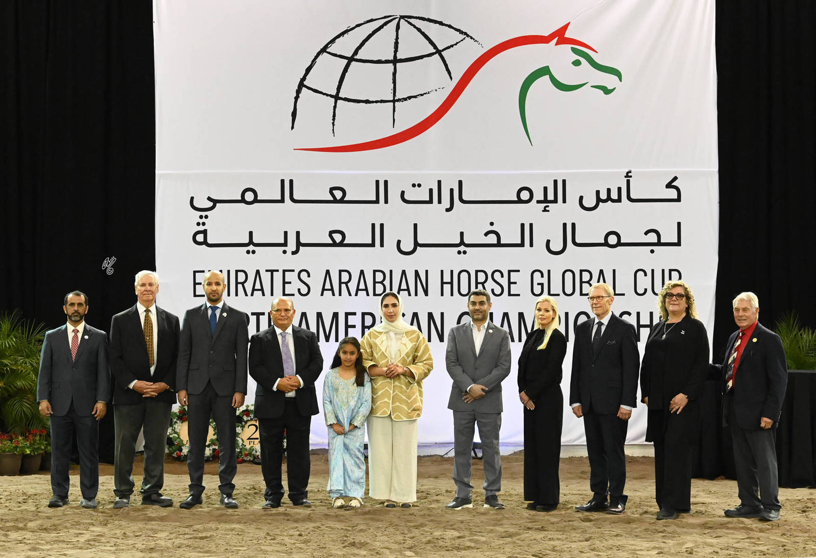 (l-to-r) Mr. Hamad Alharthi, Dennis Eikenberry (USA), Mr. Eidha Almenhali, Dr. Amira Abdelwahab, H.E. Hessa Alshuwaihi, H.E. Mohamed Al Harbi, Judge Kathleen Ohlsson (SWE), Judge Van Jacobson (USA),Judge Laura Mascagna (ITA), Ringmaster Juan Stuckey (USA)
