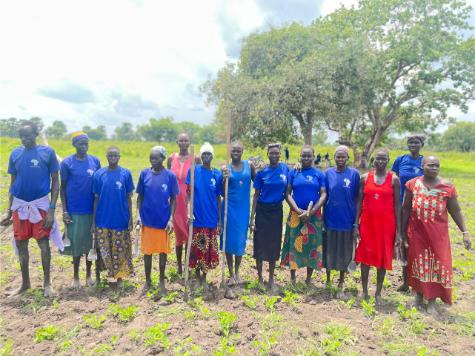 A group of people standing in a field