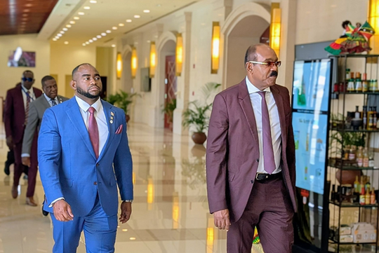 Antigua and Barbuda Prime Minister Gaston Browne, right, and Trinidad and Tobago Foreign and Caricom Affairs Minister Sean Sobers make their way to a plenary session at the 49th Regular Meeting of the Conference of Heads of Government of Caricom in Montego Bay, Jamaica, yesterday. PHOTO BY CHE TEEKERSINGH